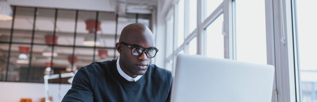 Man writing a business plan