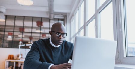 Man writing a business plan